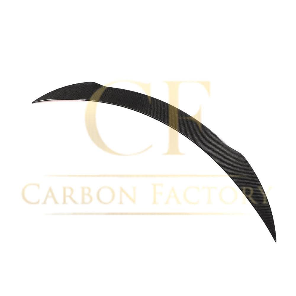 Carbon fibre boot spoiler for Mercedes Benz A205 C-Class Convertible, AMG-style, enhances sporty look and aerodynamics.