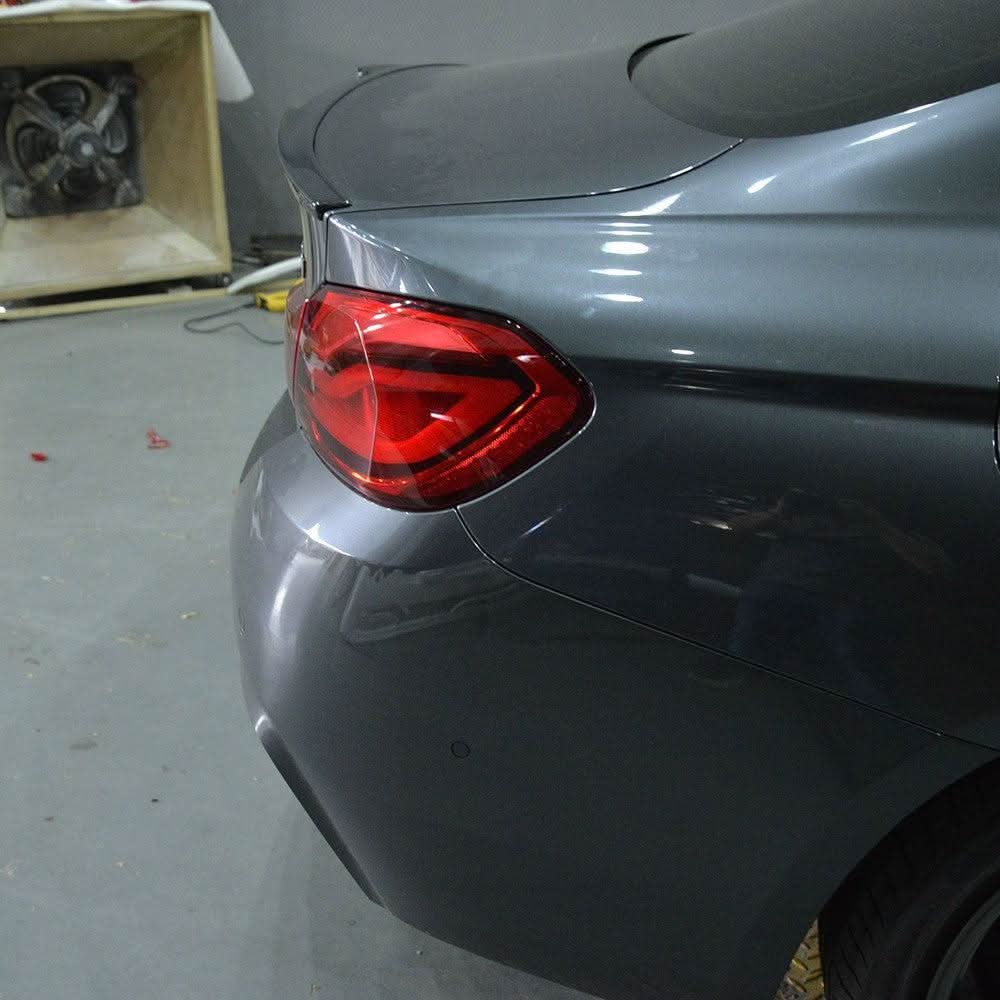 OEM style carbon fiber boot spoiler for BMW 4 Series F36 Gran Coupe, enhancing sporty look and aerodynamics.