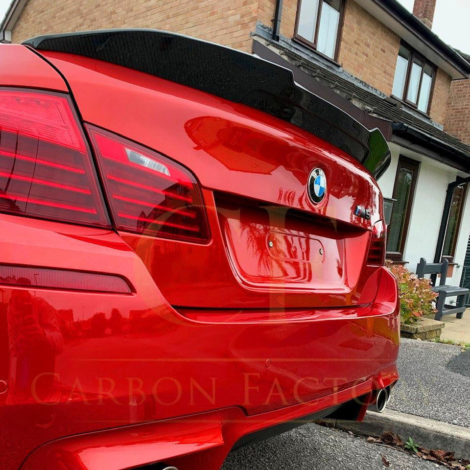 Carbon fibre boot spoiler for BMW 5 Series F10 and M5, featuring sleek aerodynamic design and high-quality carbon fibre material.