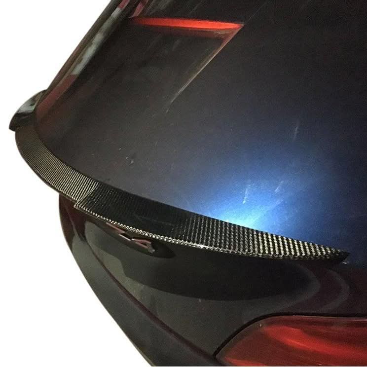 V Style carbon fibre boot spoiler for BMW E89 Z4 2009-2015, lightweight and aerodynamic, enhances sporty rear appearance.