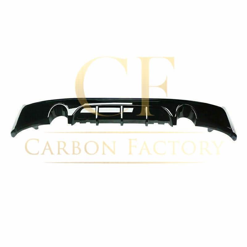 Gloss black rear diffuser with dual exhaust for BMW F22 2 Series M Sport, featuring sleek design and aerodynamic details.