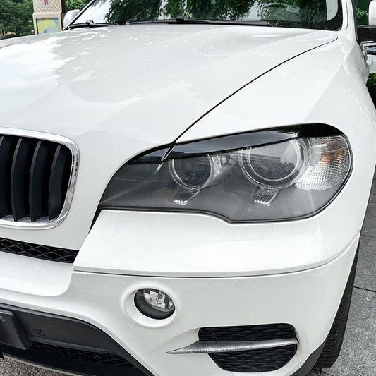 Gloss Black Headlight Trims for BMW E70 X5 08-14 - Carbon Factory
