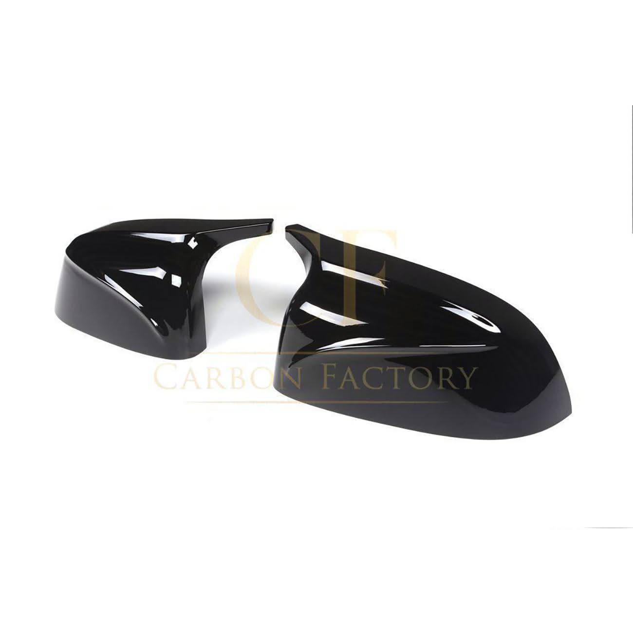 Gloss black CF style replacement mirror covers for BMW G01 X3, G02 X4, G05 X5, G06 X6, G07 X7 models, 2018-2025.
