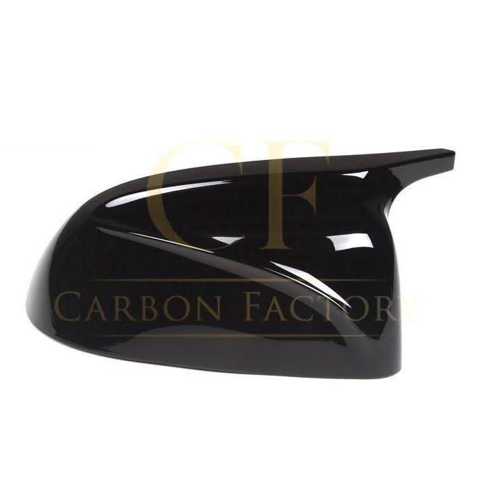 CF Style gloss black replacement mirror covers for BMW G01 G02 X3 X4 X5 X6 X7 models, showcasing sleek exterior upgrade.
