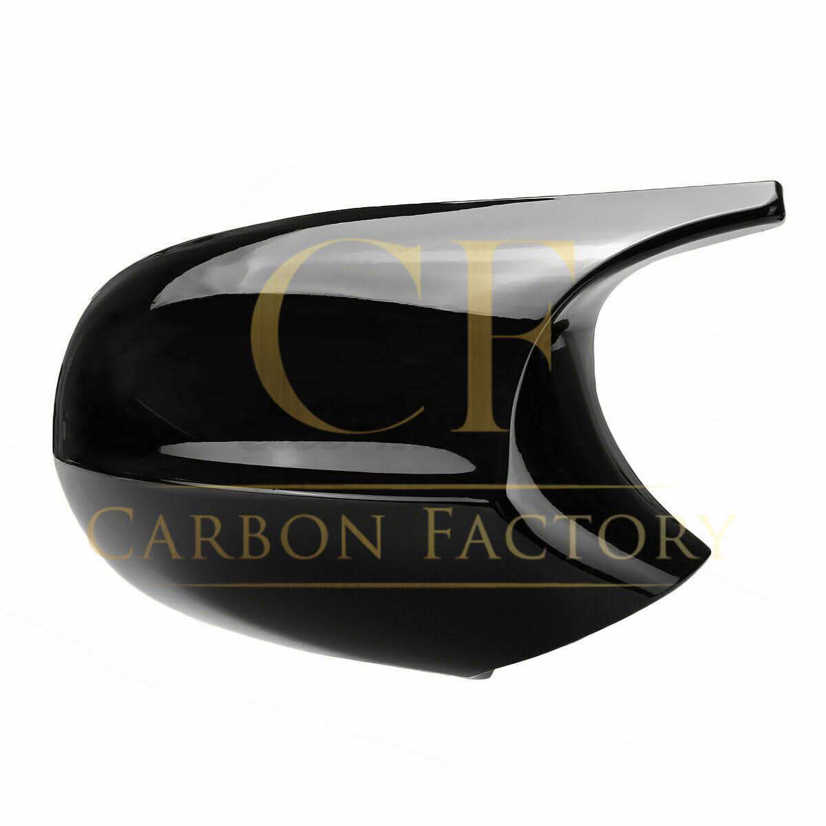 Gloss black MP Style replacement mirror covers for BMW 1 and 3 Series, fitting models E81 to E93, shown on the vehicle.