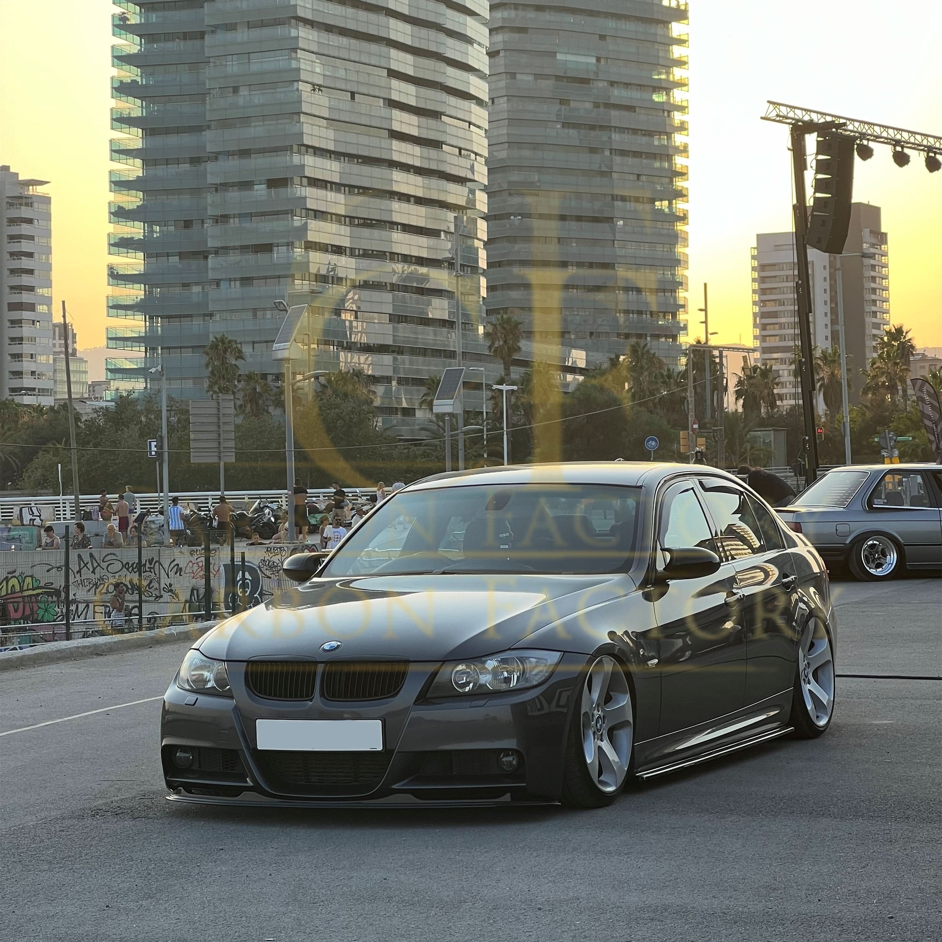 Gloss black front splitter for BMW E90 3 Series Pre-LCI, designed for a sleek, sporty look on the bumper.