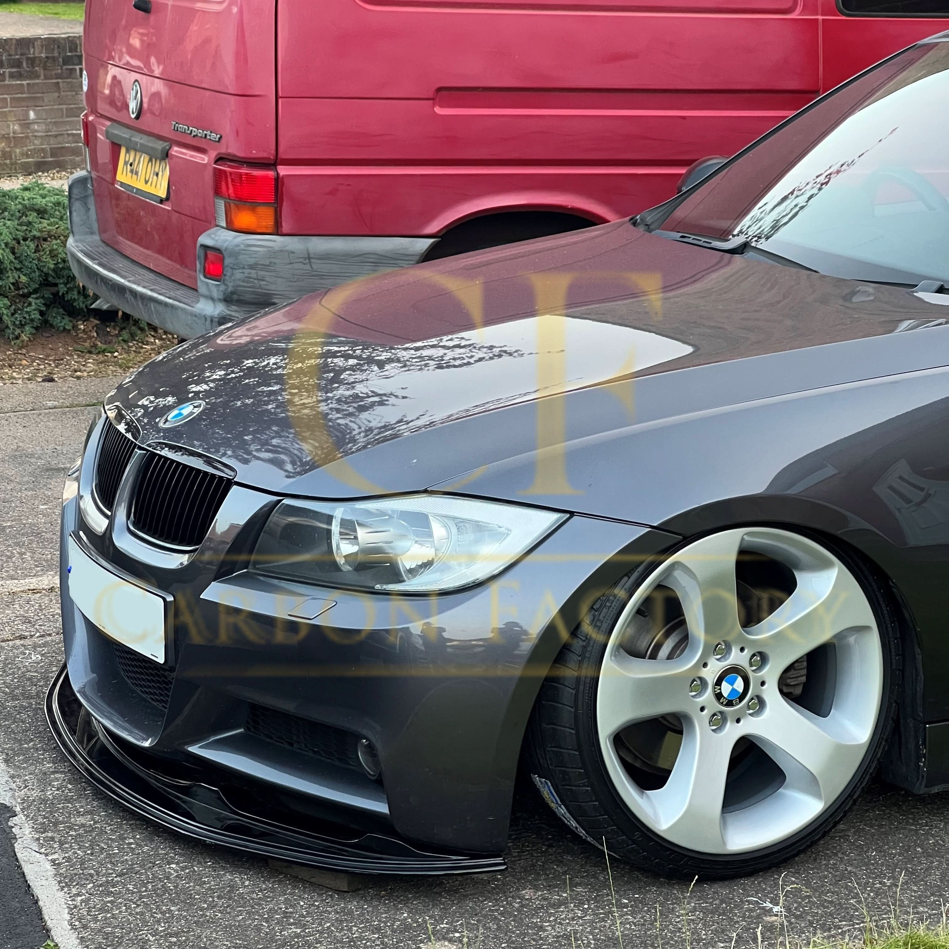 Gloss black front splitter for BMW E90 3 Series Pre-LCI 05-08, showcasing the sleek aerodynamic design and fitment details.