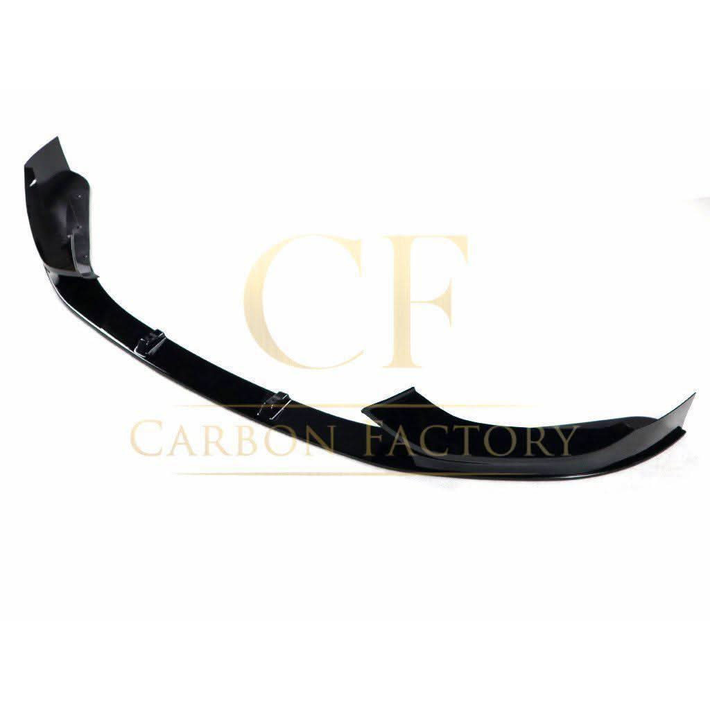 Gloss black front splitter for BMW F20 F21 1 Series LCI, featuring aerodynamic design and fitting front bumper.
