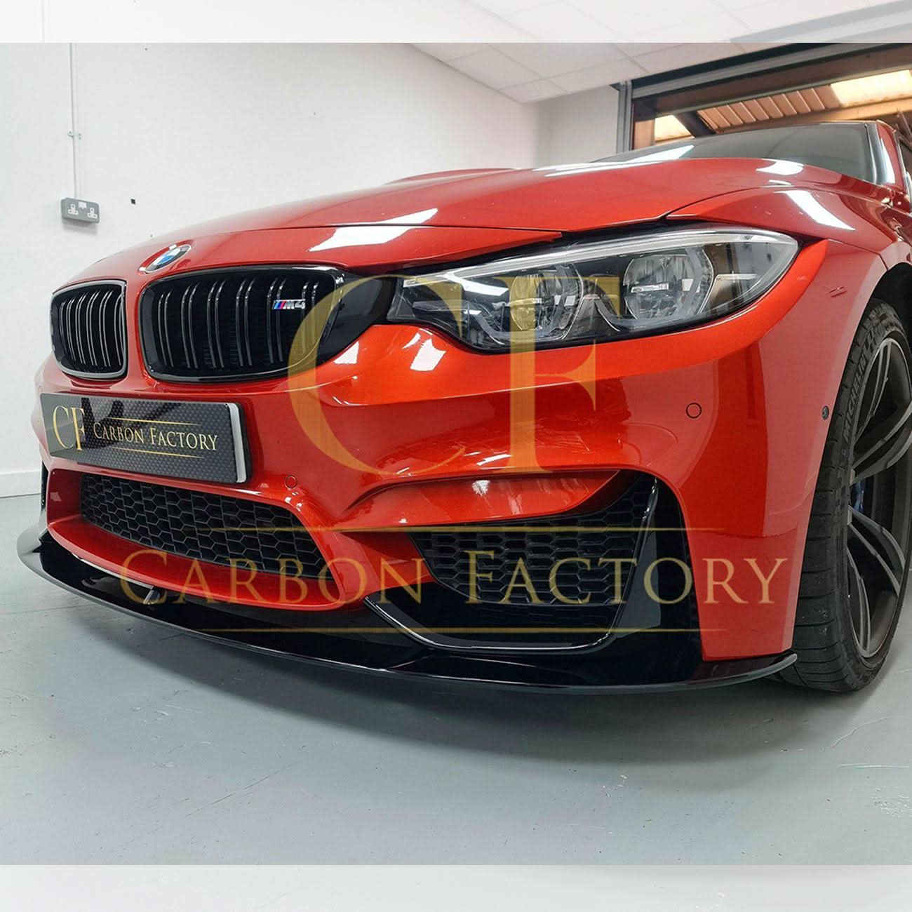Gloss black MP Style front splitter for BMW F80 M3, F82 F83 M4 models from 2014 to 2020, shown installed on the vehicle.