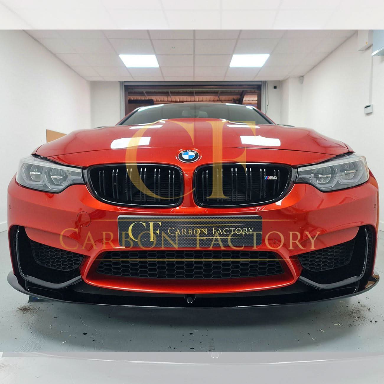 Gloss black MP Style front splitter for BMW F80 M3, F82 F83 M4 models, featuring aerodynamic design and precise fitment.