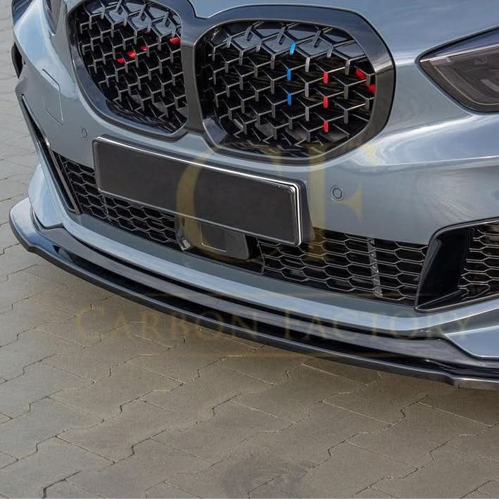 Gloss Black RS Style front splitter for BMW F40 1 Series 2019-2024, featuring a sleek, aerodynamic design for enhanced vehicle appearance.