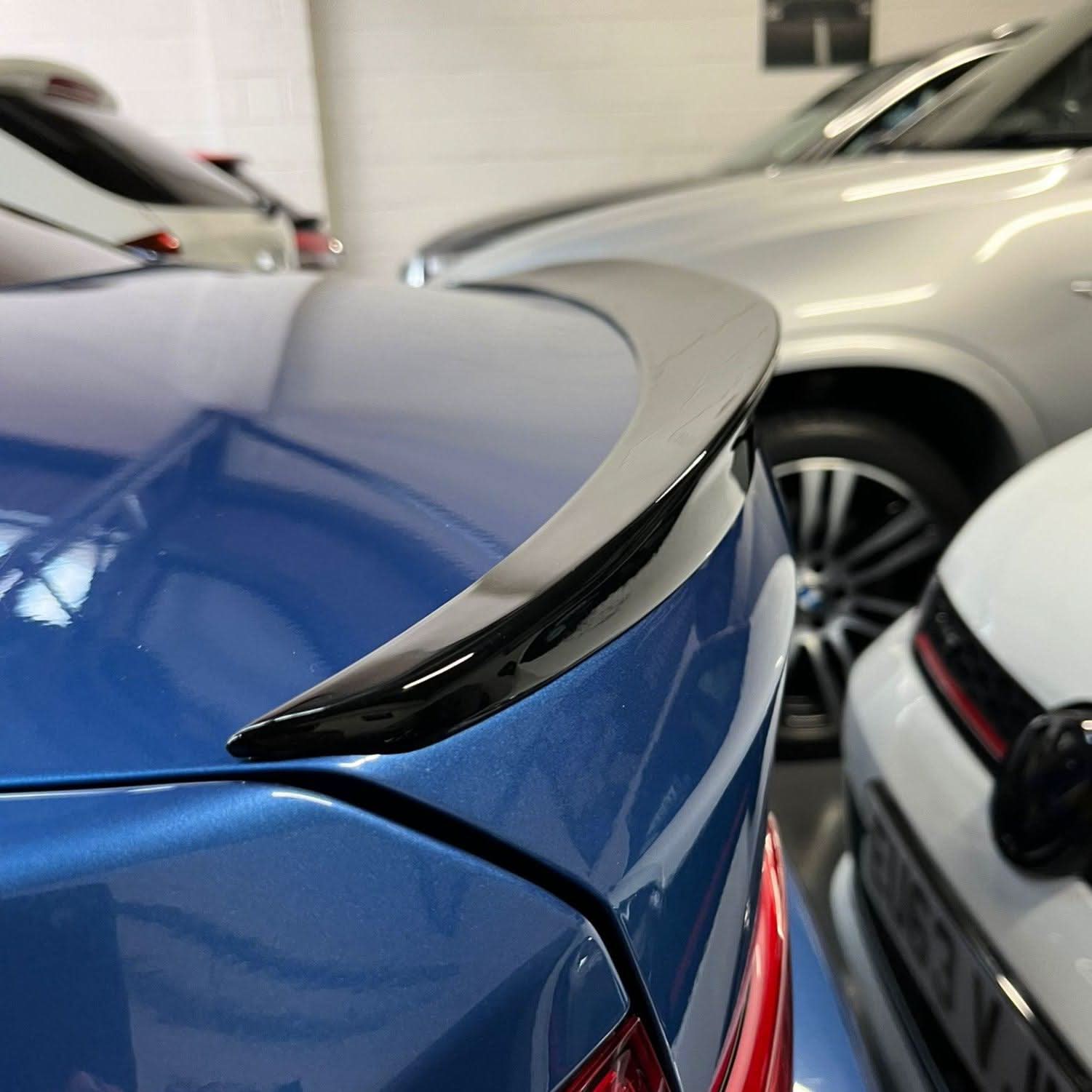 Gloss black MP Style boot spoiler for BMW 3 Series F30 F80 Saloon including M3, enhances sporty look and aerodynamics.