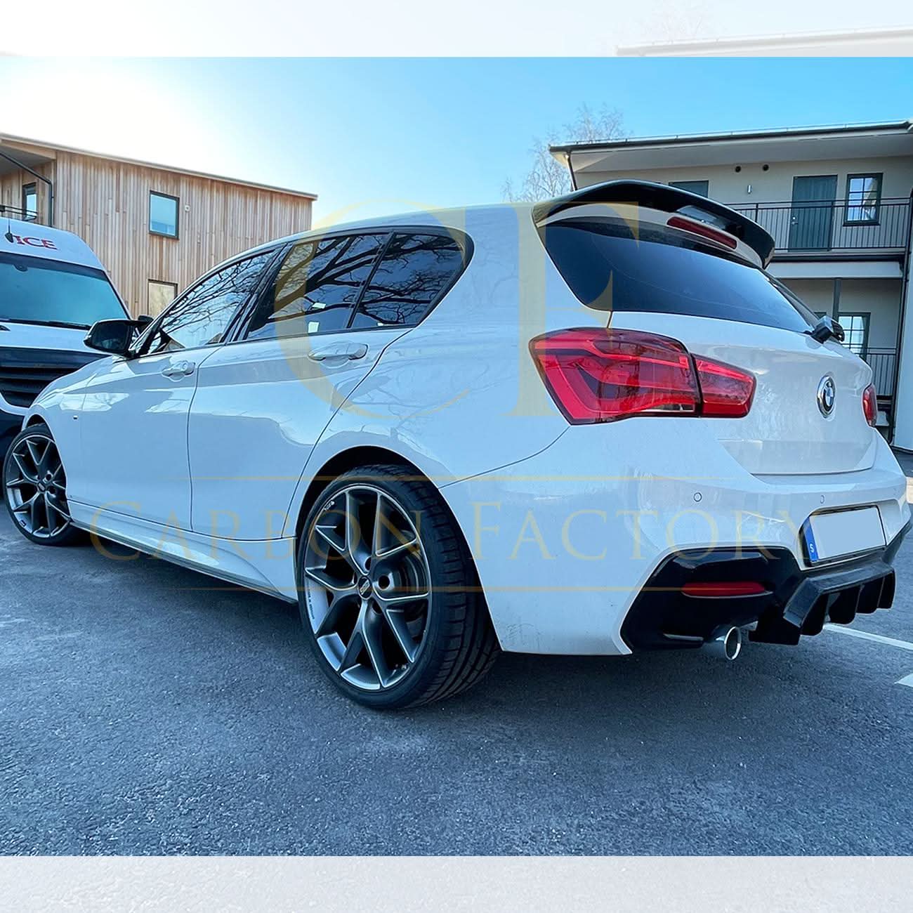 Gloss black roof spoiler for BMW F20 F21 1 Series, MP Style, installed on the car's roof for sporty aerodynamics and enhanced appearance