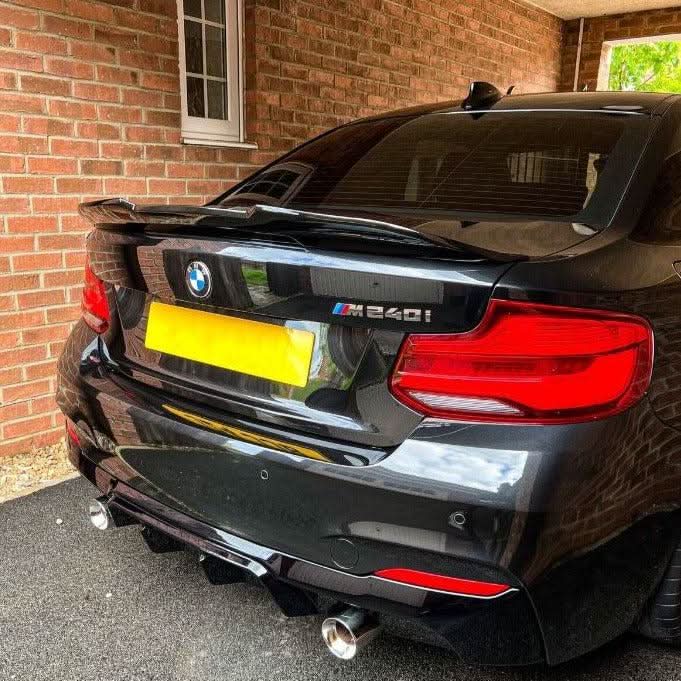 Gloss black PSM style boot spoiler for BMW F22 2 Series and F87 M2, enhancing sporty rear appearance.