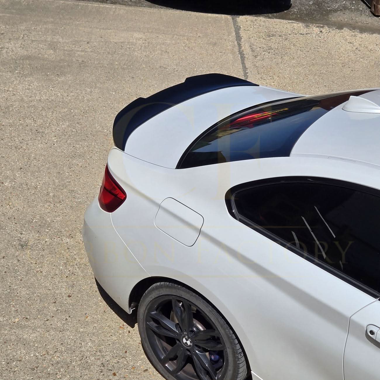 Gloss black PSM style boot spoiler for BMW F22 2 Series and F87 M2, enhances rear sporty appearance.