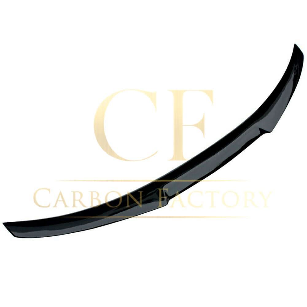 Gloss black V-style boot spoiler for BMW 4 Series F32 coupe, enhancing sporty look and aerodynamics.
