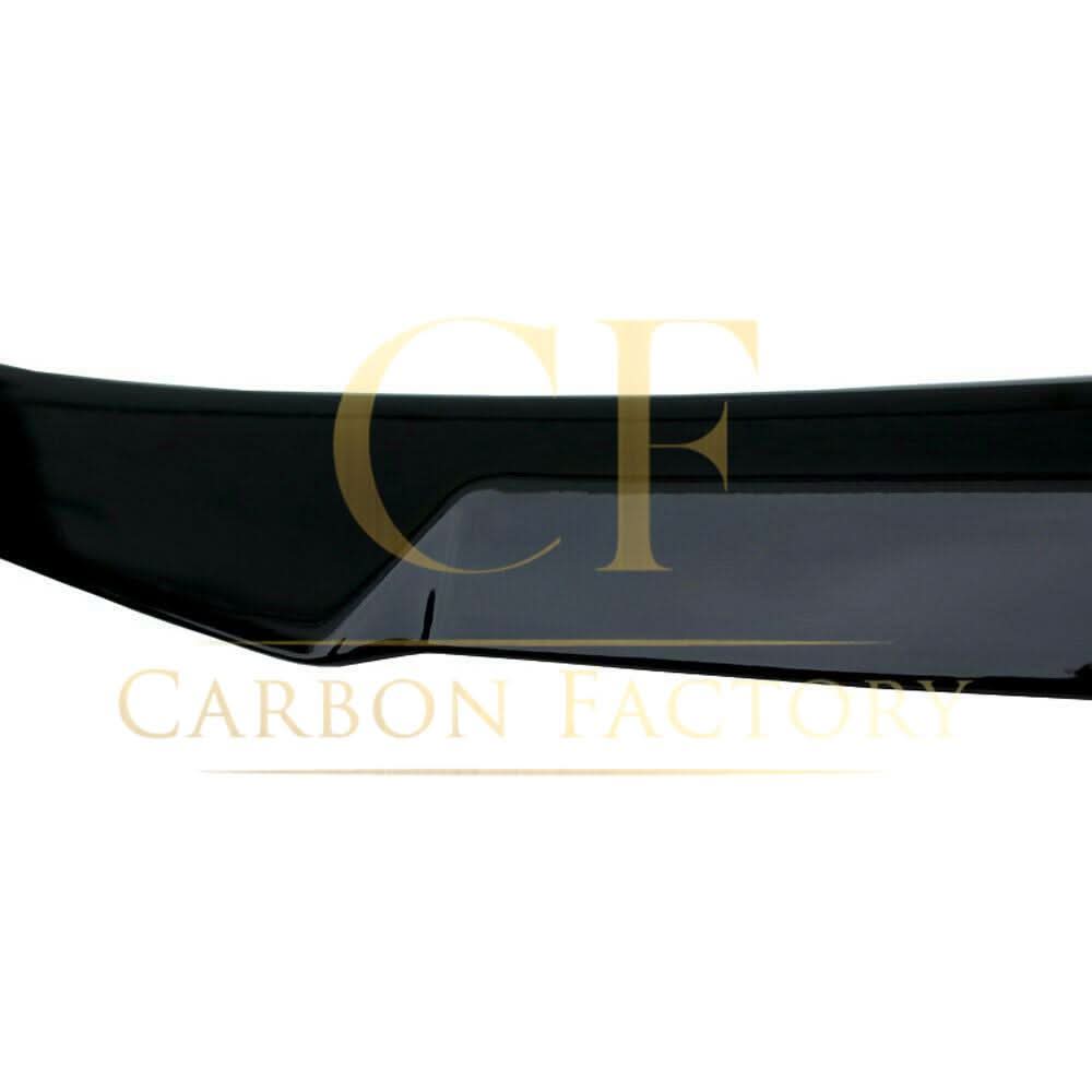 Gloss black V-style boot spoiler for BMW 4 Series F32 coupe (2014-2020), enhances sporty look and aerodynamic performance.