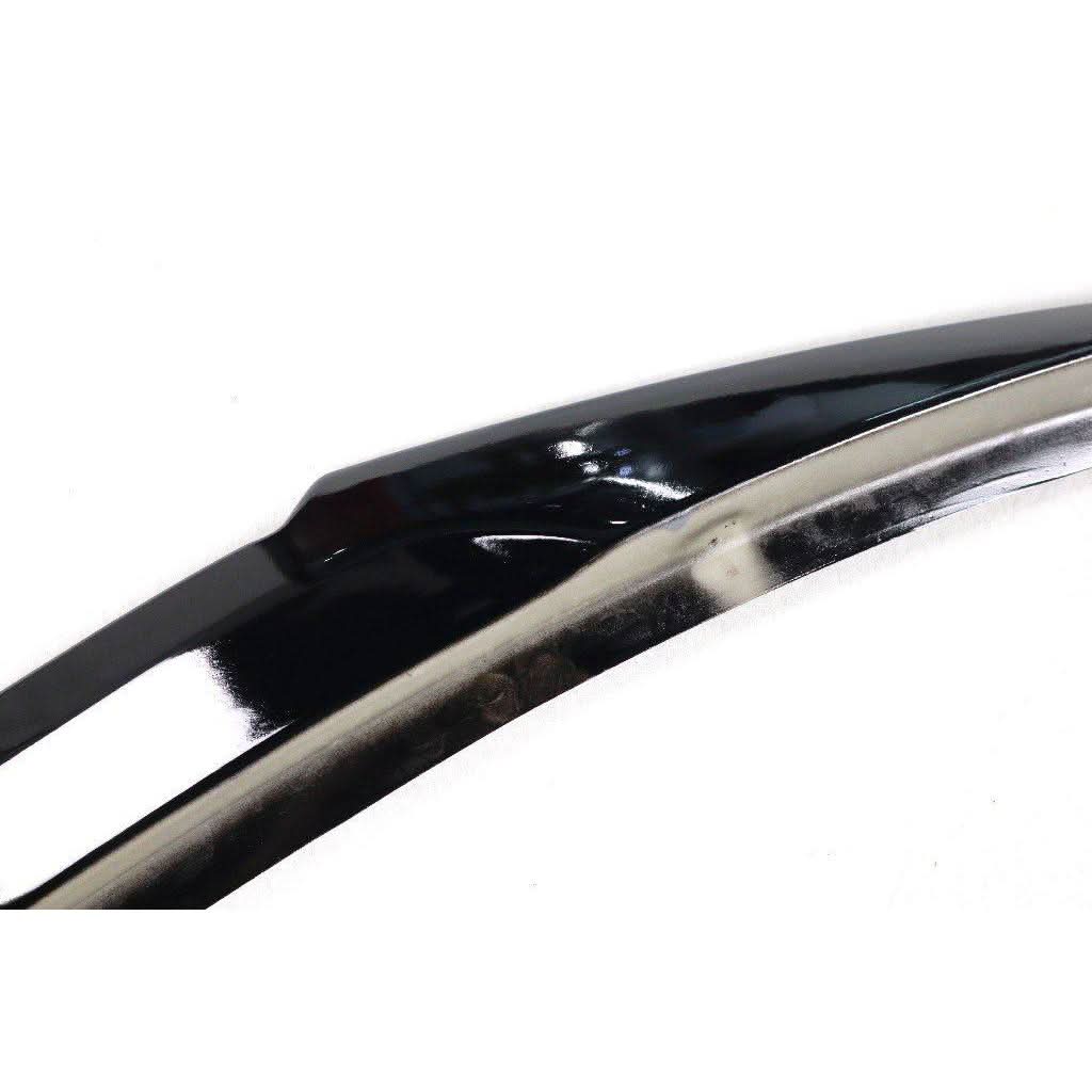 Gloss black V-style boot spoiler for BMW F22 2 Series and F87 M2, showcasing sleek aerodynamic design on the car's rear.