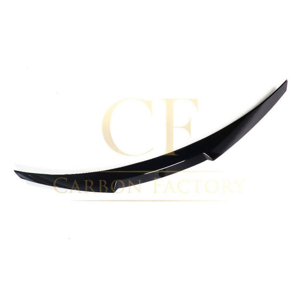 Gloss black V-style boot spoiler for BMW F82 M4 coupe 2014-2020, shown installed on the rear trunk lid.