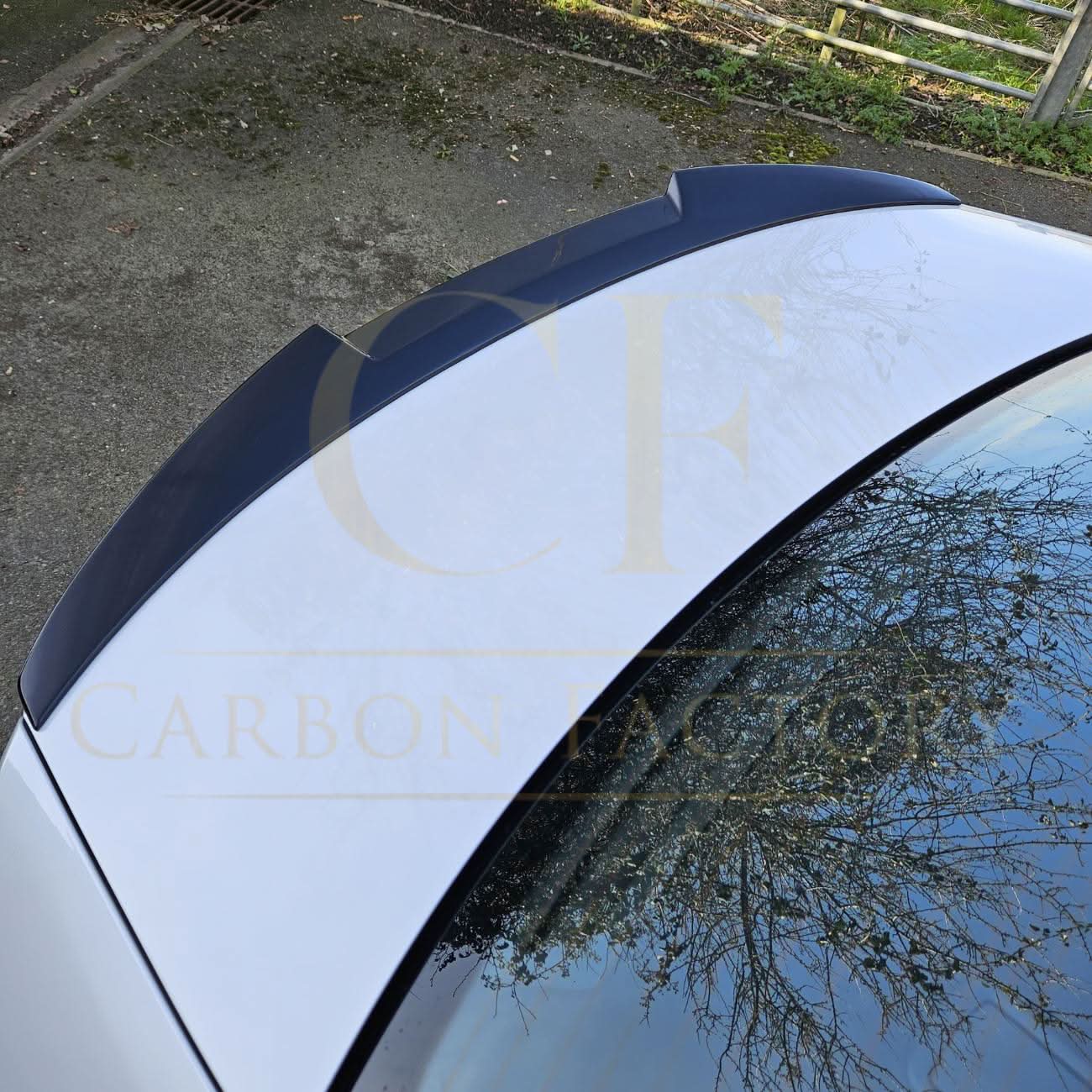 Gloss black V-style boot spoiler for BMW G20 3 Series G80 M3, made for 2019-present models, shown on a vehicle.