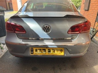 Carbon fibre boot spoiler for VW Passat CC B7 (2011-2018) with sleek design, enhancing aerodynamics and sporty look.