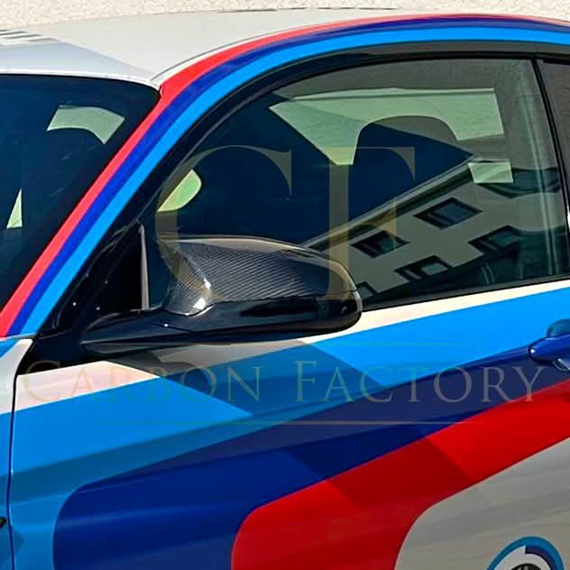 Pre-Preg Carbon fibre replacement mirror covers for BMW F80 M3, F82 F83 M4, F87 M2 Comp, right-hand drive, sleek car accessory.