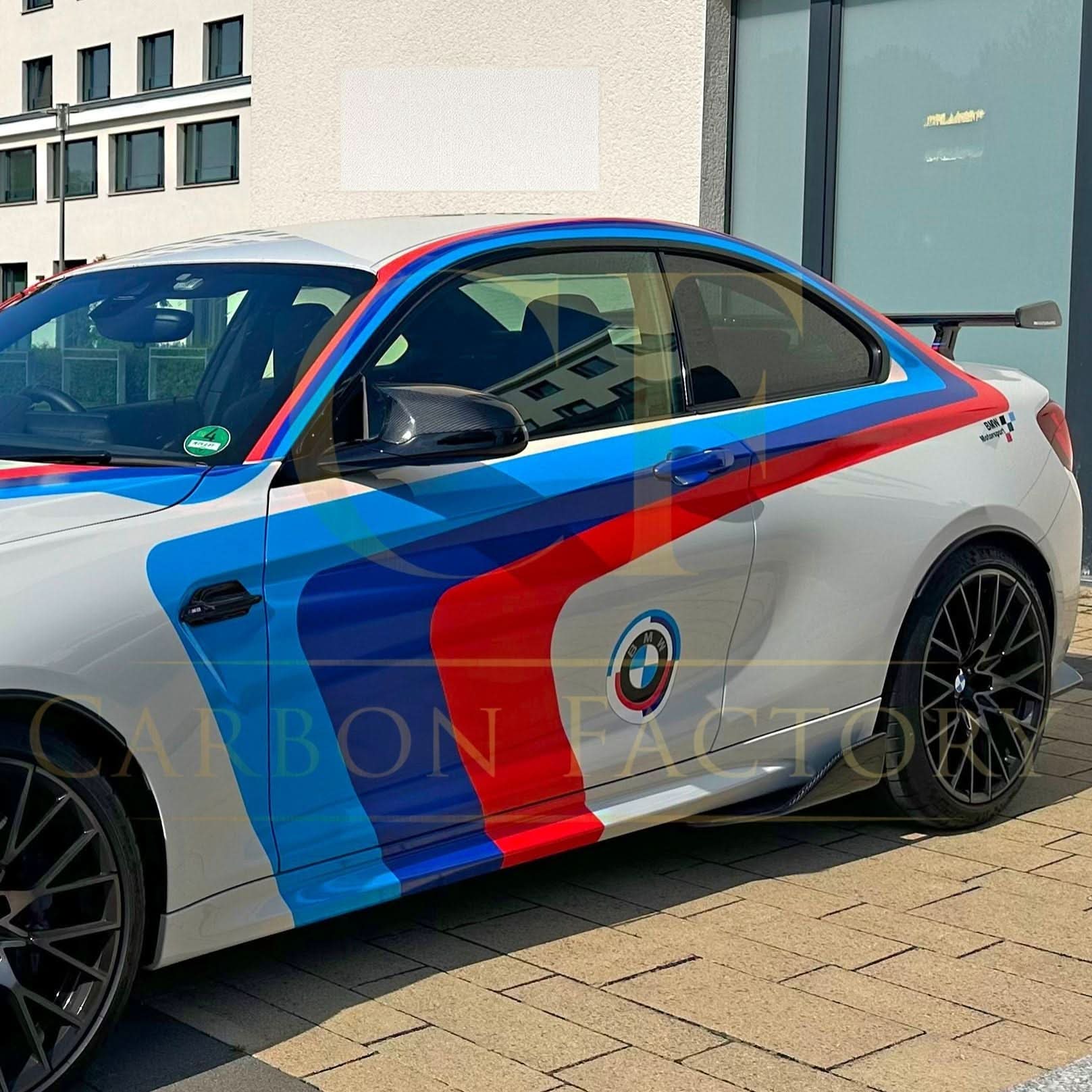Pre-Preg Carbon Fibre BMW F80 M3, F82 F83 M4, F87 M2 Comp right-hand drive mirror covers installed on vehicle.