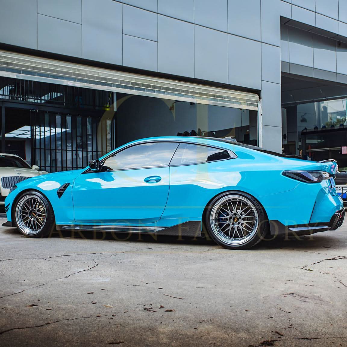 Pre-Preg Carbon fibre side skirts for BMW G82 G83 M4 2021-present, showcasing sleek aerodynamic design and high-quality material.