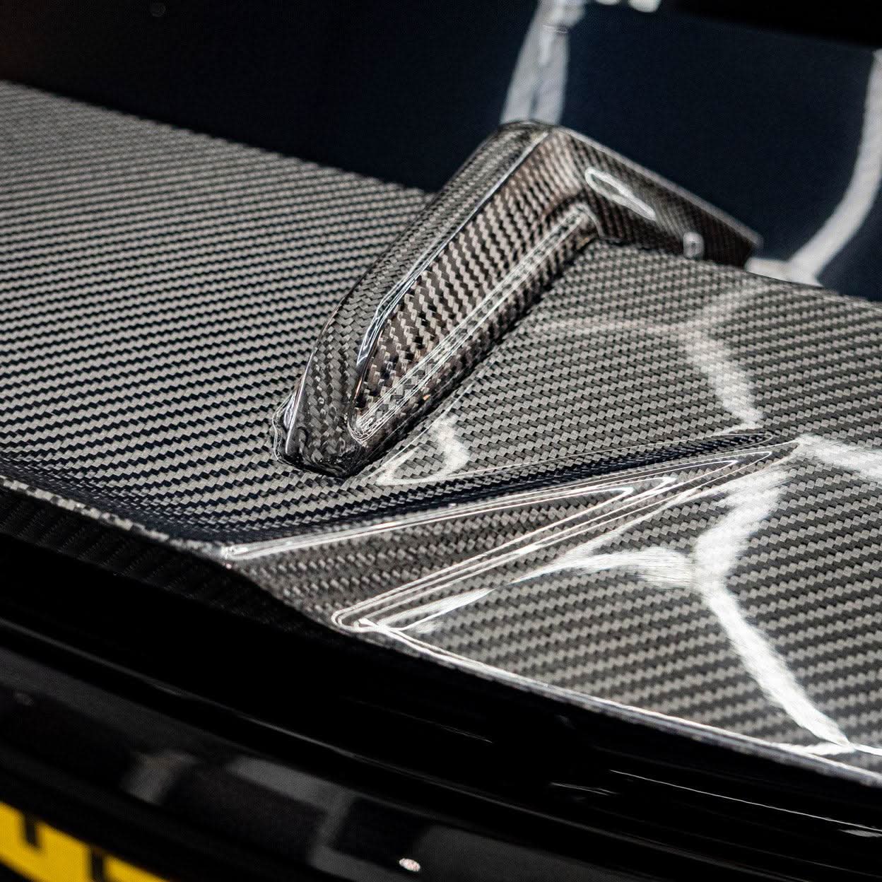 Pre-Preg Carbon fibre boot spoiler for BMW G80 M3 G82 M4, showcasing sleek aerodynamic design and high-quality finish.